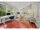 Comfortable bedroom with a desk, hardwood floors, and lots of natural light at 1558 Line St, Decatur, GA 30032