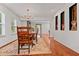 Bright dining room features hardwood floors, a chandelier, and classic wood furniture at 1558 Line St, Decatur, GA 30032