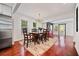 Bright dining room features hardwood floors, a chandelier, and classic wood furniture at 1558 Line St, Decatur, GA 30032