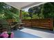 Cozy front porch with comfortable seating, perfect for relaxing and enjoying the outdoors at 1558 Line St, Decatur, GA 30032