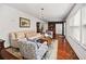 Comfortable living room features hardwood floors, bright lighting, and chic interior design at 1558 Line St, Decatur, GA 30032