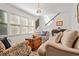 Bright and airy living room with hardwood floors, comfortable seating, and natural light at 1558 Line St, Decatur, GA 30032
