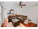 Open layout reveals living room with hardwood floors and cozy, neutral furniture at 1558 Line St, Decatur, GA 30032