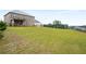 Spacious backyard featuring an extended lawn at 1604 Falcon Ct, Locust Grove, GA 30248