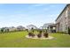 Spacious backyard featuring an extended lawn at 1604 Falcon Ct, Locust Grove, GA 30248