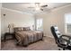 Bedroom with a bed and plantation shutters at 1604 Falcon Ct, Locust Grove, GA 30248