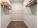 Spacious walk-in closet with wire shelving provides ample storage at 1604 Falcon Ct, Locust Grove, GA 30248