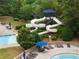 Exterior view of the community's waterslide and pool, offering a playful and refreshing recreational area for residents at 1604 Falcon Ct, Locust Grove, GA 30248