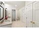 Clean bathroom with double sink, granite countertop, glass shower, and white tile flooring at 3042 Argonne Dr, Atlanta, GA 30305