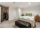 Finished basement bedroom with a large closet and a queen sized bed at 3042 Argonne Dr, Atlanta, GA 30305