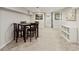 Finished basement with carpet, a table with chairs, and ample space for recreation at 834 Timberland Se St, Smyrna, GA 30080