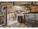 Basement space with exposed ductwork, shelving, and storage space on unfinished floor at 834 Timberland Se St, Smyrna, GA 30080