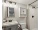 Updated bathroom featuring gray vanity, modern lighting, and a stall shower at 834 Timberland Se St, Smyrna, GA 30080
