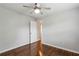 Spacious bedroom featuring hardwood floors, a ceiling fan, and ample natural light at 834 Timberland Se St, Smyrna, GA 30080