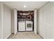 Convenient laundry area with washer and dryer hookups inside a basement closet space at 834 Timberland Se St, Smyrna, GA 30080