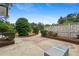 Inviting backyard patio area with comfortable seating, showcasing a serene and private outdoor living space at 834 Timberland Se St, Smyrna, GA 30080