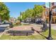 Street view of Smyrna Market Village with benches at 834 Timberland Se St, Smyrna, GA 30080