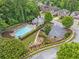 Aerial view of neighborhood pool and outdoor grilling space with parking at 3729 Inglewood Ne Way, Atlanta, GA 30319