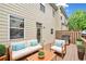 Back deck with comfortable outdoor seating and grill at 3729 Inglewood Ne Way, Atlanta, GA 30319