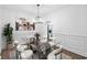 Elegant dining room with modern chandelier, chic decor, and stylish seating for gatherings at 3729 Inglewood Ne Way, Atlanta, GA 30319