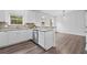 Functional kitchen with white cabinets, granite countertops, and stainless steel dishwasher, perfect for meal prep at 3729 Inglewood Ne Way, Atlanta, GA 30319