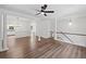 Inviting living space with hardwood floors, stylish columns, and great flow to other rooms at 3729 Inglewood Ne Way, Atlanta, GA 30319