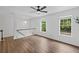 Bright loft space with hardwood floors, natural light, and ample room for various activities at 3729 Inglewood Ne Way, Atlanta, GA 30319