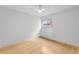 Bright bedroom with a window and ceiling fan, complemented by light hardwood floors at 387 Ralph Mcgill Ne Blvd # K, Atlanta, GA 30312