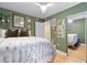 Bright bedroom featuring stylish decor, a ceiling fan, and a mirrored closet at 387 Ralph Mcgill Ne Blvd # K, Atlanta, GA 30312