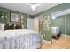 Inviting bedroom featuring a mirrored closet and a view into a connected room at 387 Ralph Mcgill Ne Blvd # K, Atlanta, GA 30312