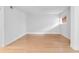 Bright, minimalist bedroom with hardwood floors, white walls, and large window for natural light at 387 Ralph Mcgill Ne Blvd # K, Atlanta, GA 30312