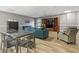 Spacious common area featuring ample seating, wood-look floors, and a large entertainment center at 387 Ralph Mcgill Ne Blvd # K, Atlanta, GA 30312