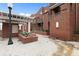 Charming brick townhome with well-maintained landscaping and a welcoming courtyard entrance at 387 Ralph Mcgill Ne Blvd # K, Atlanta, GA 30312