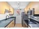 Modern kitchen featuring stainless steel appliances, sleek countertops, and ample cabinet space at 387 Ralph Mcgill Ne Blvd # K, Atlanta, GA 30312