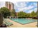 The pool has lounge chairs and shade, perfect for relaxation and recreation at 387 Ralph Mcgill Ne Blvd # K, Atlanta, GA 30312