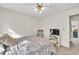 Bedroom featuring plush carpet, a Queen-sized bed and flatscreen TV at 422 Inwood Trail Trl, Lawrenceville, GA 30043
