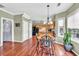 Bright dining area adjacent to kitchen, filled with natural light and neutral tones at 422 Inwood Trail Trl, Lawrenceville, GA 30043