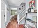 Entryway with hardwood floors, a staircase, decor, and a view of the dining room at 422 Inwood Trail Trl, Lawrenceville, GA 30043