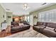 Open-concept living room flowing into the kitchen, perfect for entertaining guests at 422 Inwood Trail Trl, Lawrenceville, GA 30043