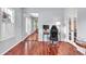 Bright office space featuring hardwood floors, a desk and a view into the hall at 422 Inwood Trail Trl, Lawrenceville, GA 30043
