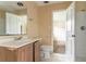 Bathroom showcasing a vanity, toilet, and a shower at 4715 Wildginger Run, Lithonia, GA 30038