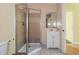 Bathroom featuring a glass shower and a vanity with a mirror at 4715 Wildginger Run, Lithonia, GA 30038