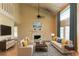 Bright living room with fireplace, vaulted ceilings, hardwood floors and neutral decor at 4715 Wildginger Run, Lithonia, GA 30038