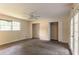 This spacious bedroom features multiple closets, a ceiling fan, and large windows at 4715 Wildginger Run, Lithonia, GA 30038