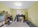 Unfinished basement featuring a window, shelving, and storage space at 6260 Sturbridge Ln, Cumming, GA 30040