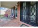 Inviting front porch featuring rocking chairs and a stylish patterned rug at 6260 Sturbridge Ln, Cumming, GA 30040