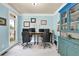 Comfortable home office setup with dual monitors, natural light, and stylish accents at 6260 Sturbridge Ln, Cumming, GA 30040
