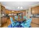 Gourmet kitchen with custom wood cabinets, stainless steel appliances, and hardwood floors at 6260 Sturbridge Ln, Cumming, GA 30040