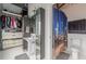 Modern bathroom includes a vanity, closet, shower with curtain, and toilet at 120 Ralph Mcgill Ne Blvd # 1502, Atlanta, GA 30308