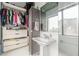 Bathroom featuring open closet space, pedestal sink, modern fixtures, and city view at 120 Ralph Mcgill Ne Blvd # 1502, Atlanta, GA 30308